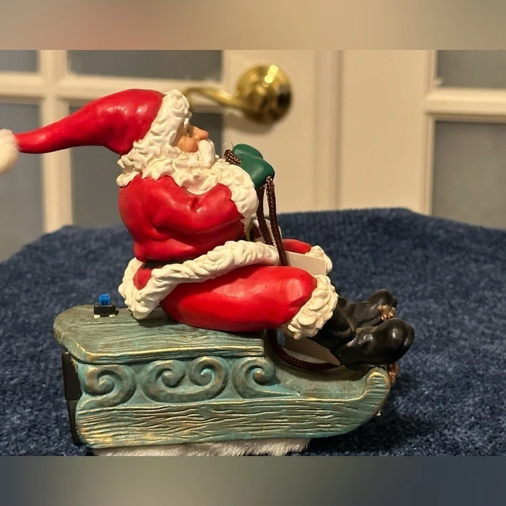 Musical vibrating Santa on his sleigh. Plays 3 songs!